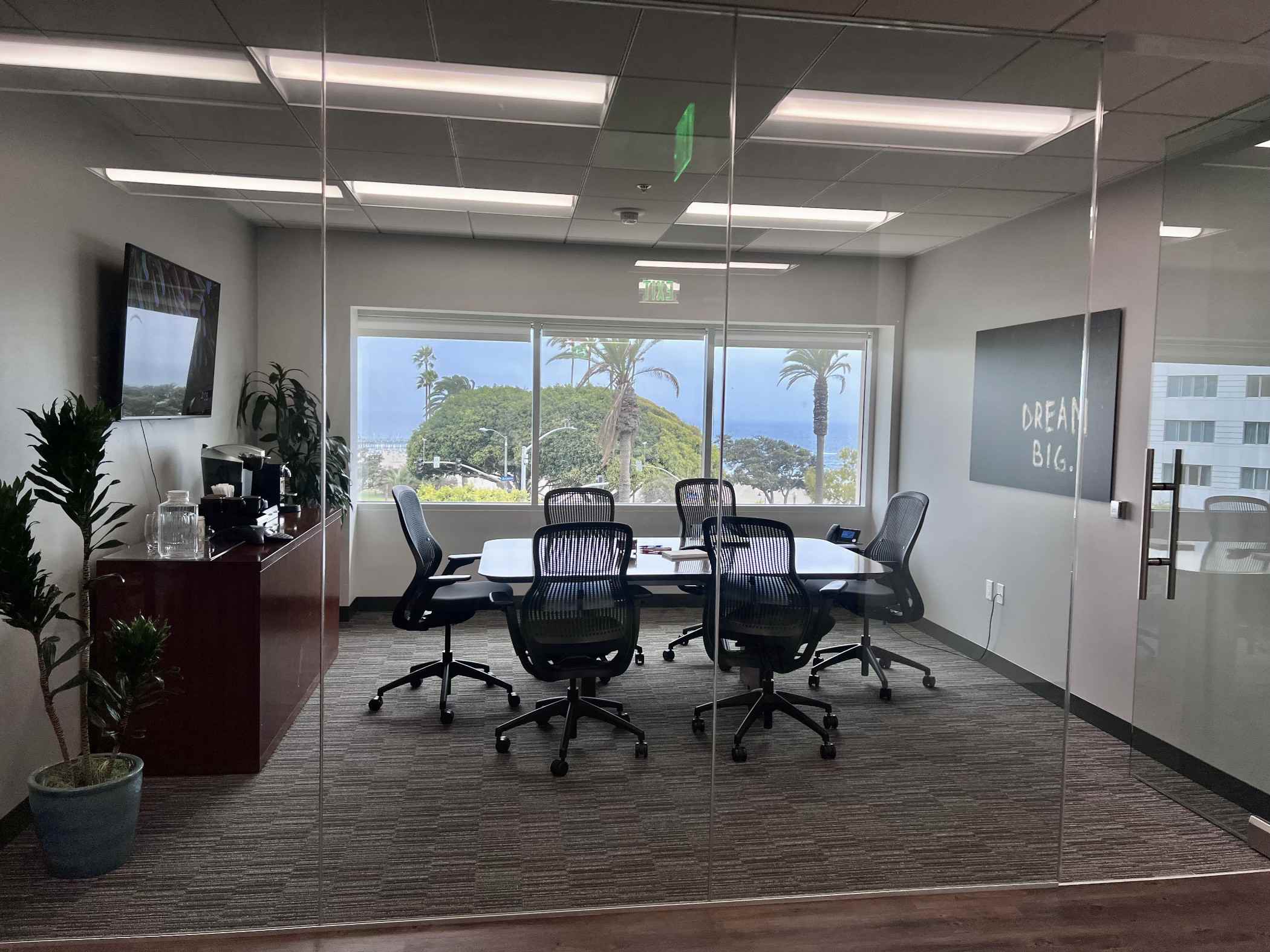 A conference room with a view of the ocean.